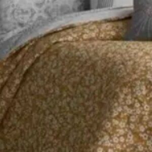 King-size quilted coverlet, cheerful and reversible, lovely stitch pattern